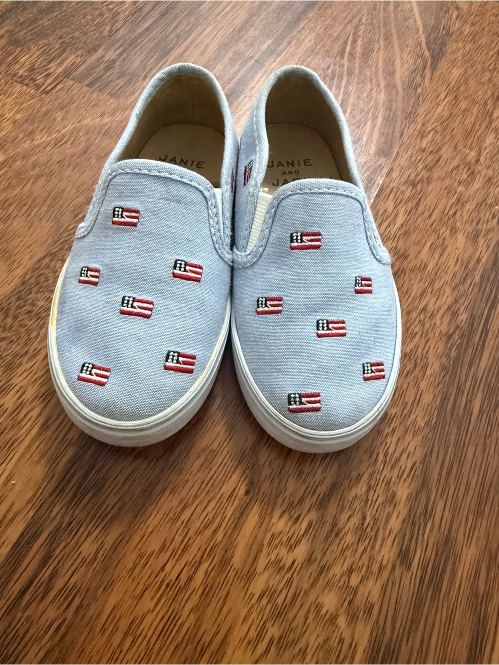 Janie and Jack Light Blue Slip-On Sneakers with Flag Embroidery